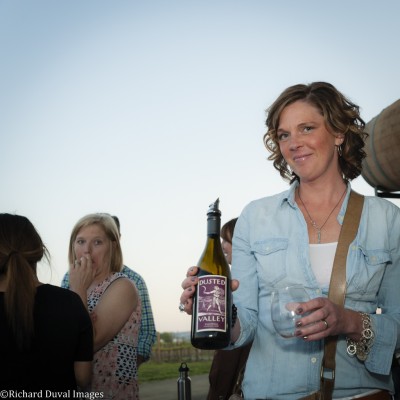 Janet pouring wine
