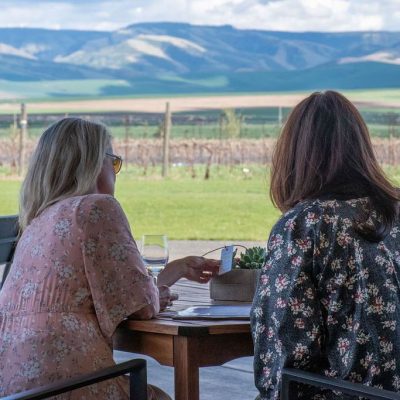 Winery tasting overlooking mountains.