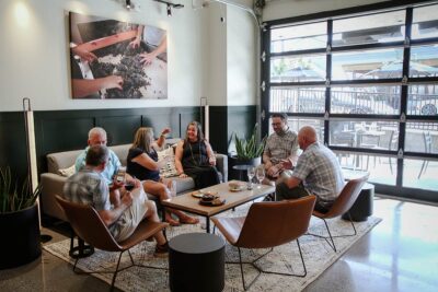 Table of guests inside Wine Bar.